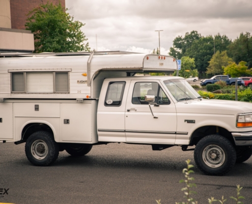 Ford truck with Alaskan camper for sale