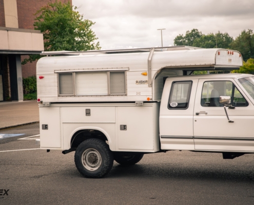 Alaskan camper mounted on ford service body